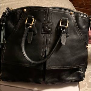Dooney & Bourke bag. These bags has lots of pockets!